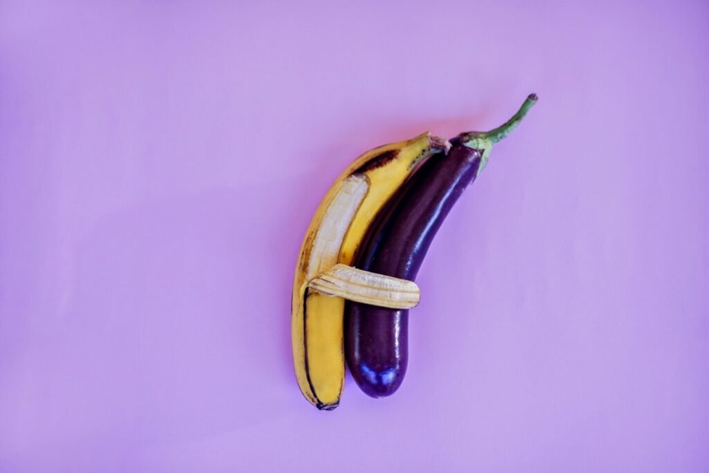 dick size banana hugging eggplant