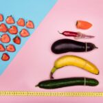 Fruit representing differnet penis sizes with condoms