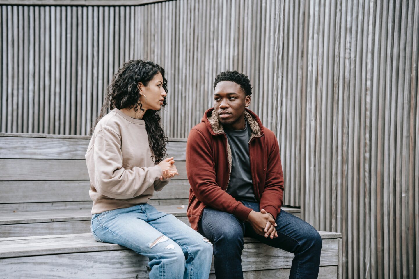couple sitting on stairs having a conversation