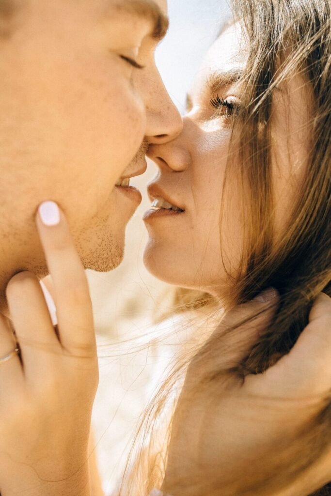 man and woman about to kiss