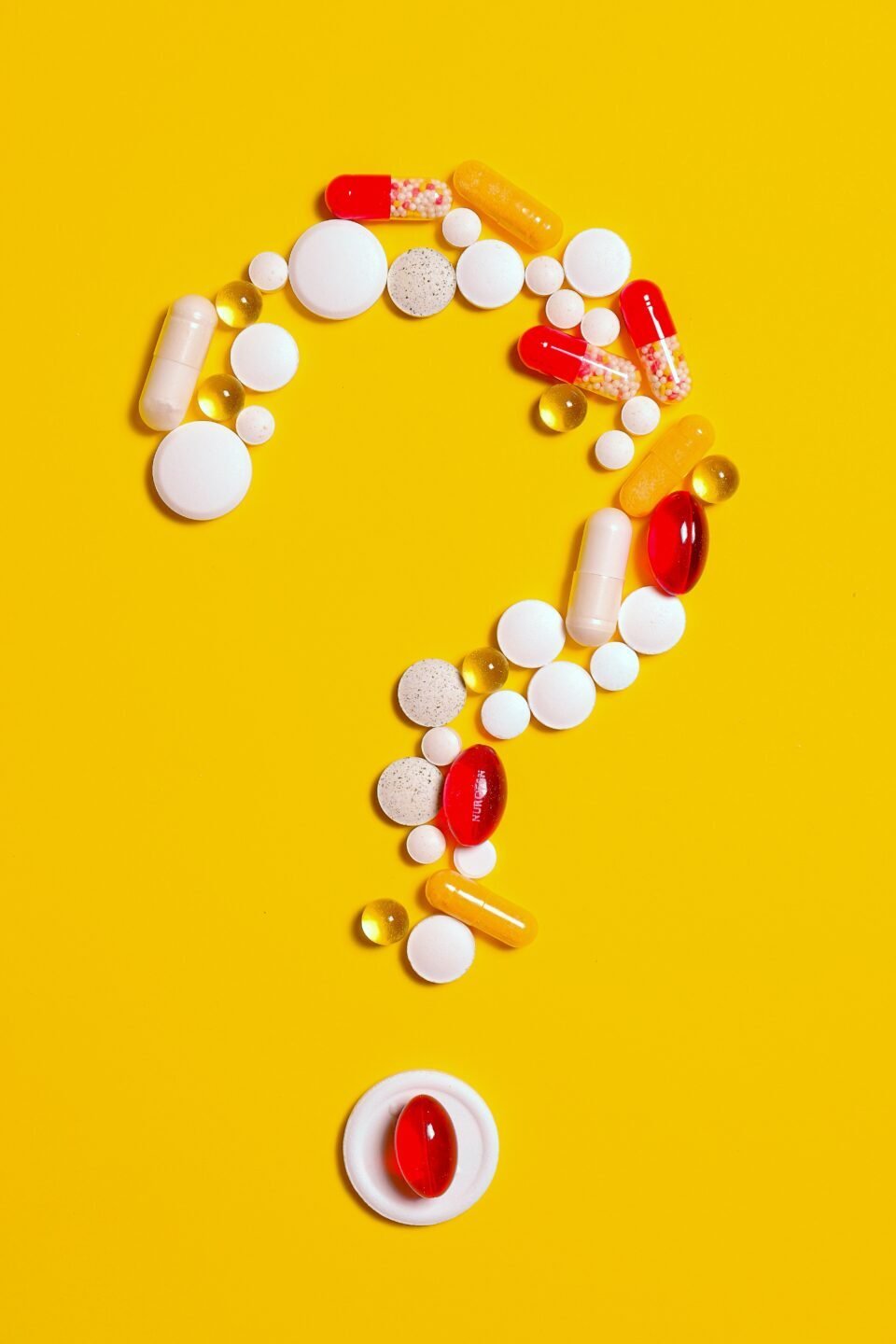 question mark made of vitamins and pills